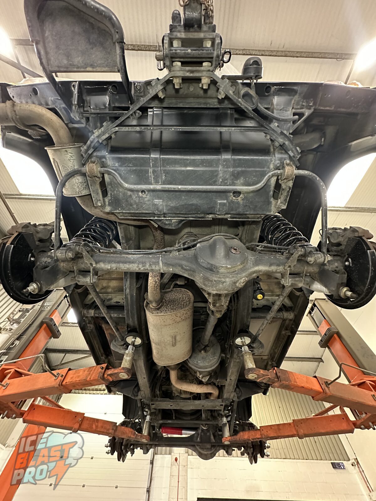 Full underbody – Years of road grime, mud and surface corrosion across the chassis rails, crossmembers and axles – the normal cost of a hard-working 4x4 on UK roads.