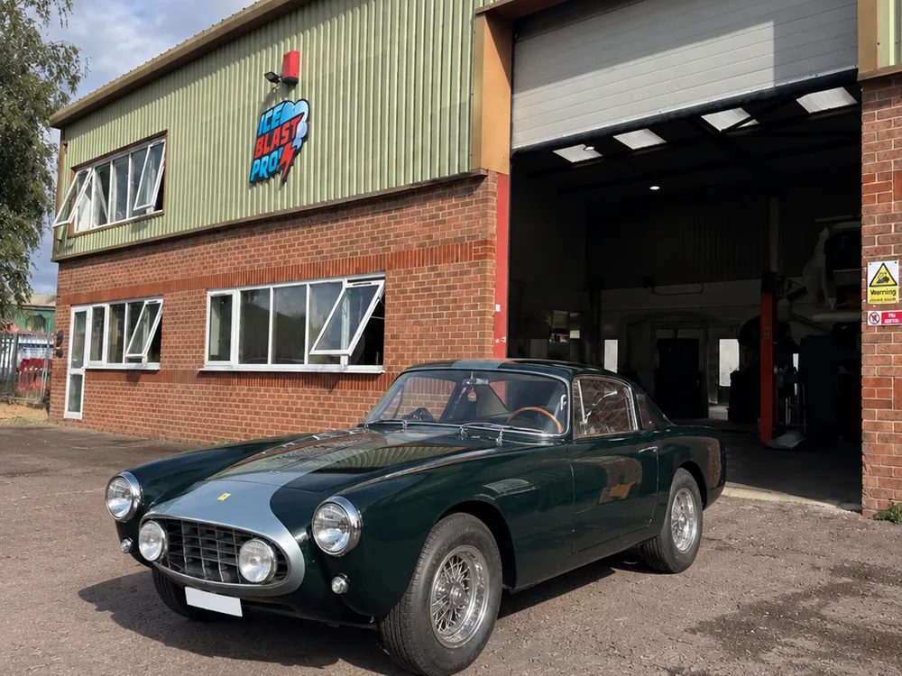 Dark green Ferrari 250 GT outside the IceBlastPro workshop in Oxfordshire