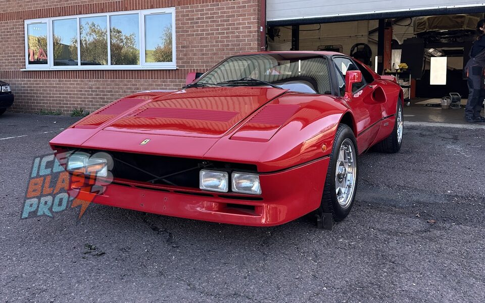 Red Ferrari 288 GTO parked outside the IceBlastPro workshop in Oxfordshire