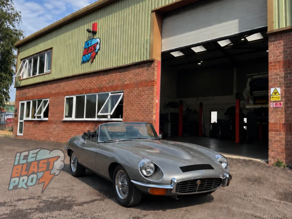 Silver Jaguar E-Type roadster outside the IceBlastPro workshop in Oxfordshire