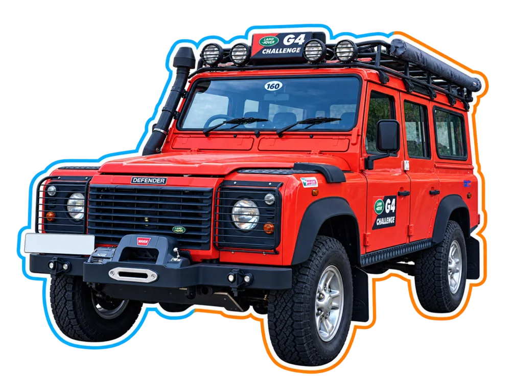 Orange Land Rover Defender G4 Challenge expedition vehicle viewed from the front