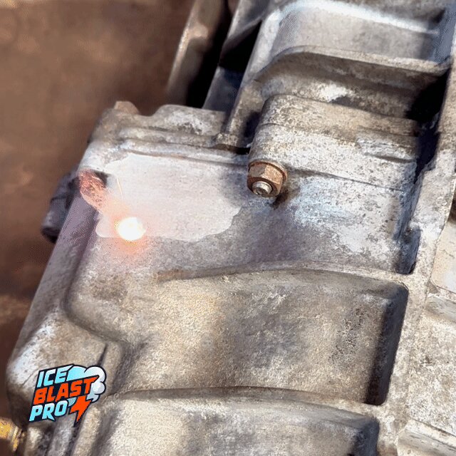Laser cleaning removing a spot of corrosion from a metal component.