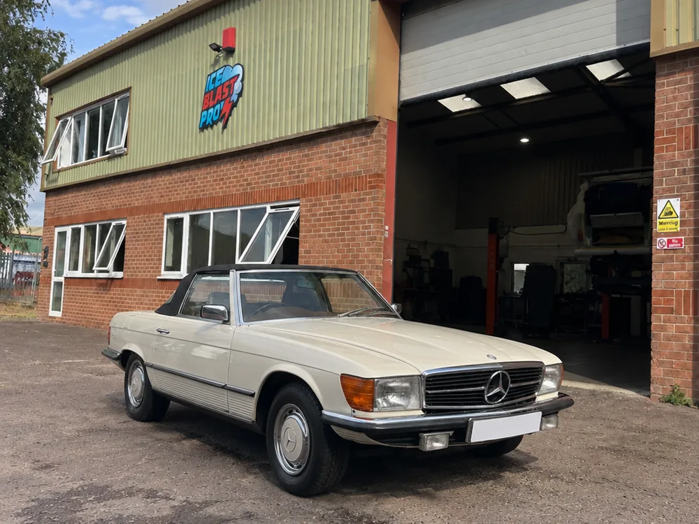 Cream Mercedes-Benz SL roadster outside the IceBlastPro workshop in Oxfordshire