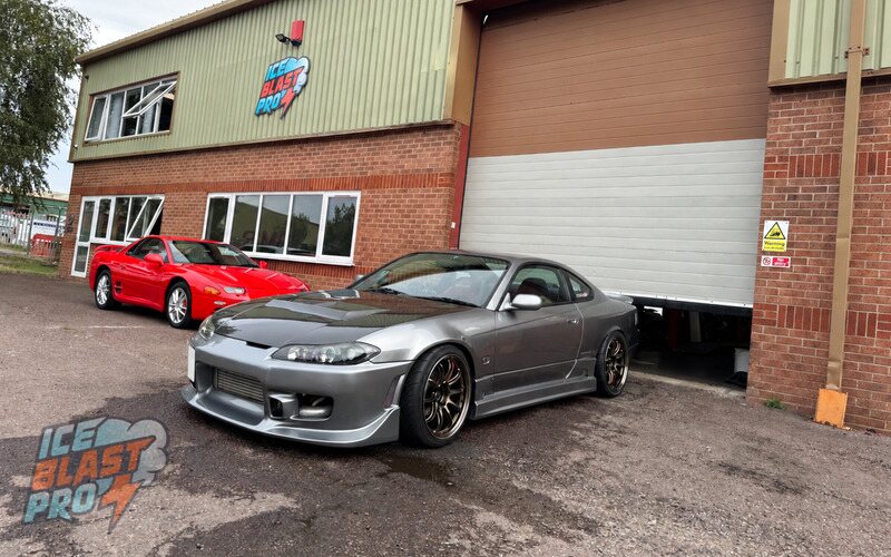 Grey Nissan Silvia S15 outside the IceBlastPro workshop