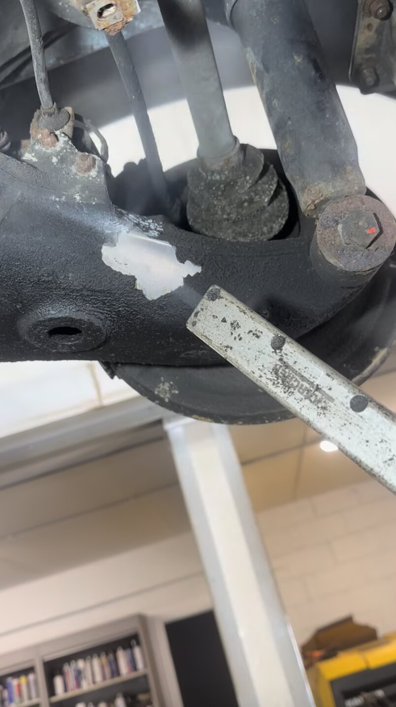 Rear lower arm – A clean patch appears across the rear lower arm as the grime is blasted back to the alloy.