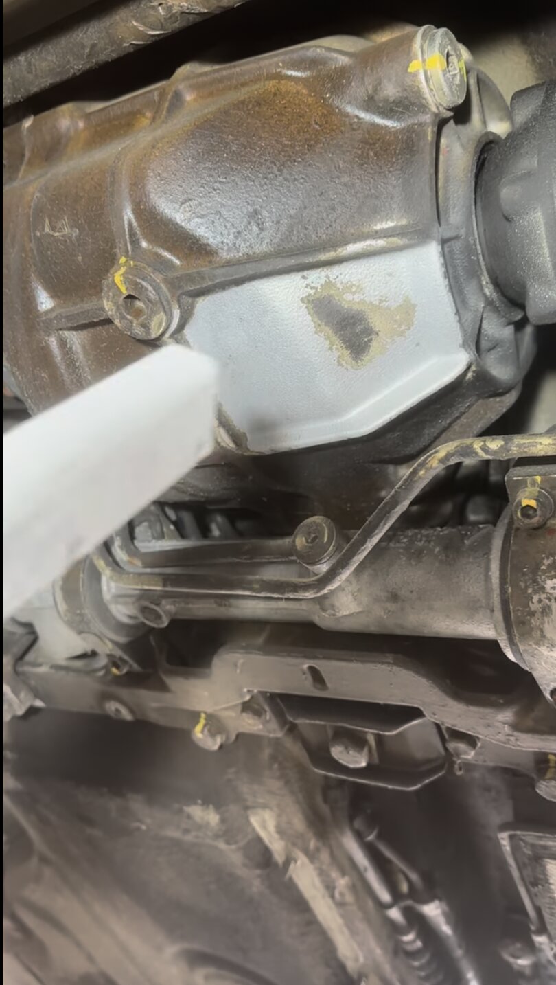 Clean metal returning – As the brown wax comes away, the original metal underneath is revealed clean and undamaged.