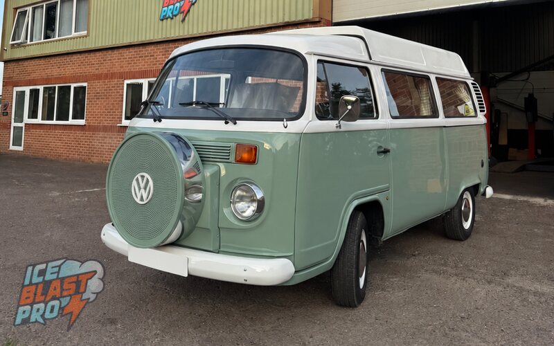 Green and white Volkswagen T2 Camper outside the IceBlastPro workshop
