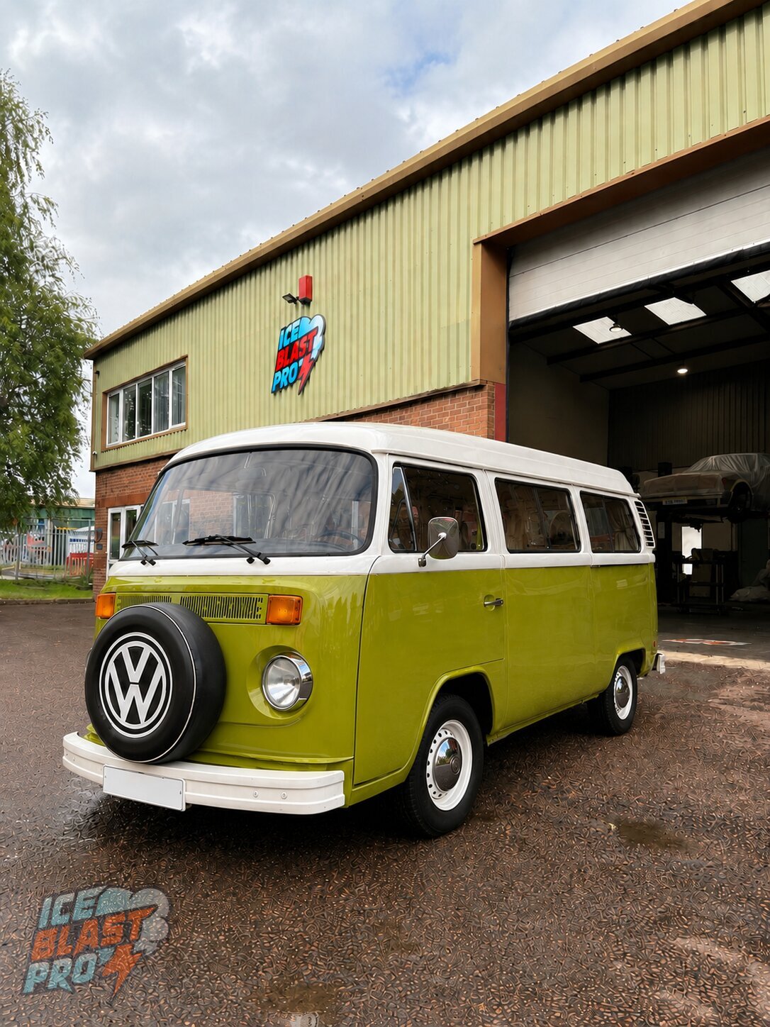 Green Volkswagen T2 camper parked outside the IceBlastPro workshop in Oxfordshire